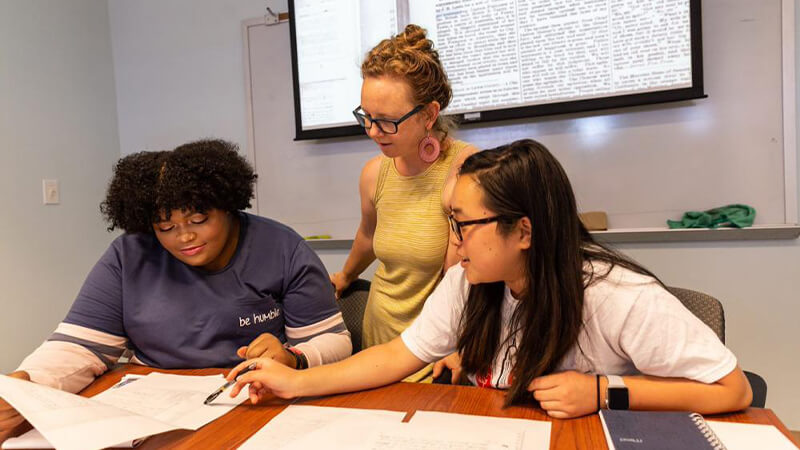 Students working with faculty member on research project