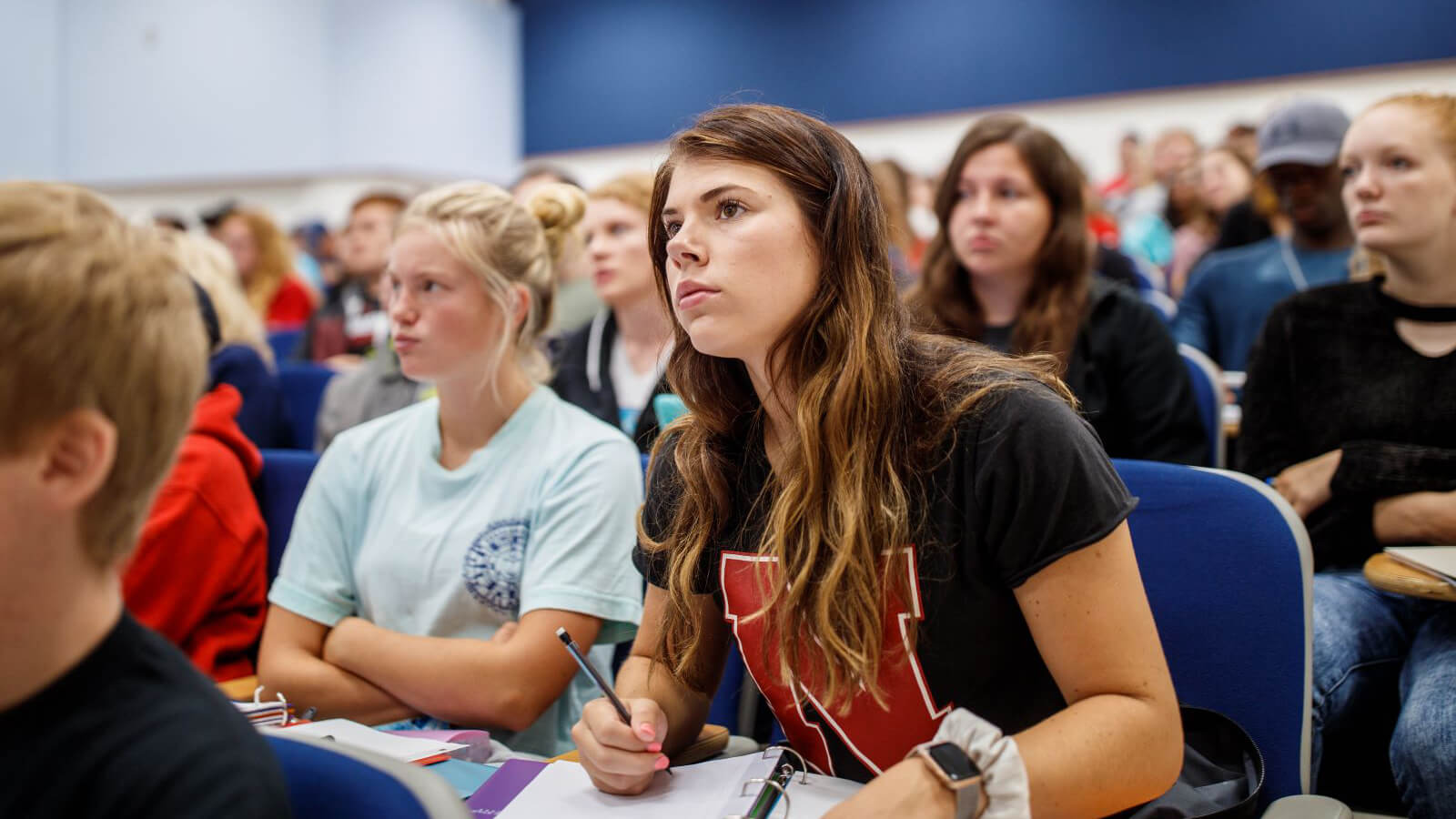 Students in classroom listening to lecture