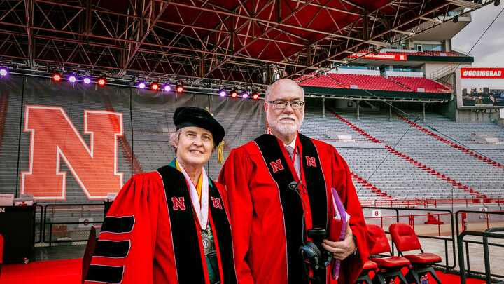 Dr. Bob and Dr. Vanessa Gorman at the 2024 undergraduate commencement in Memorial Stadium. 